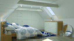 Postelja v mansardi