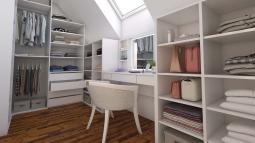 garderobna soba s kozmetično mizico v mansardi