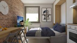 odprto ležišče skrite postelje v garsonjeri